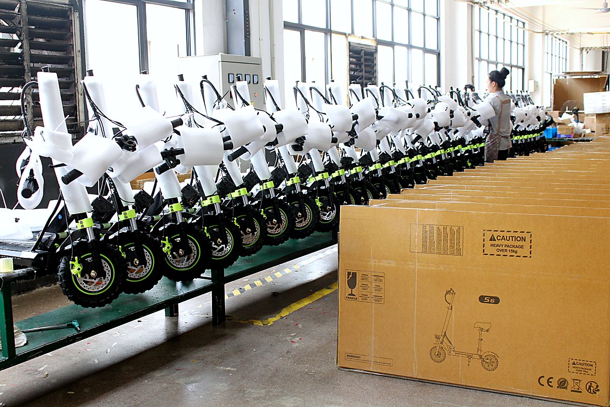 Electric scooter stock and cartons in factory